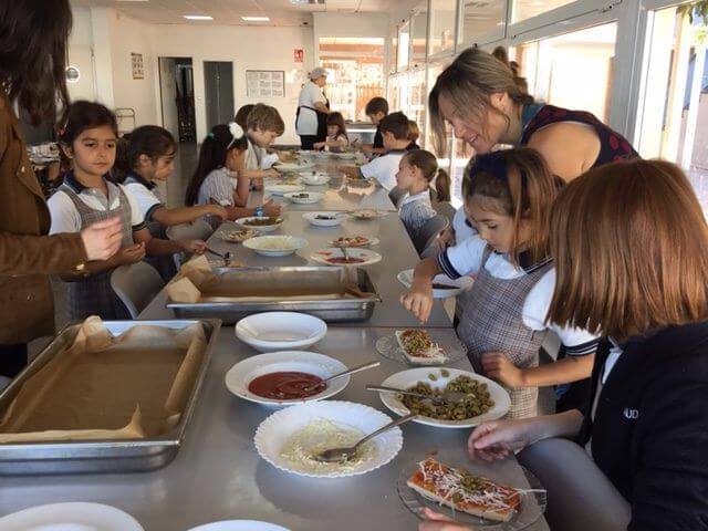 Year 2 make their own pizza!